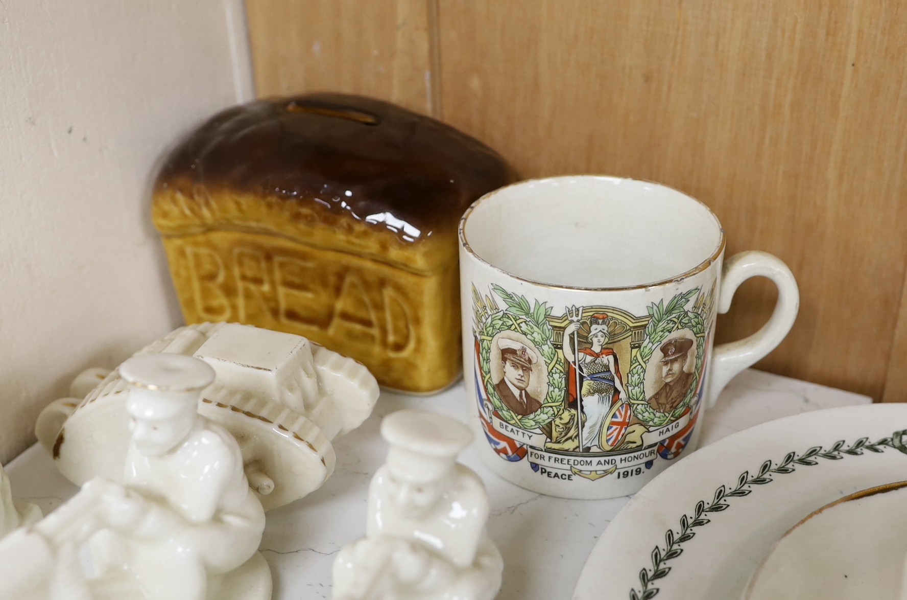 WWI commemorative ceramics - crested china including two Tommy and his Gun models